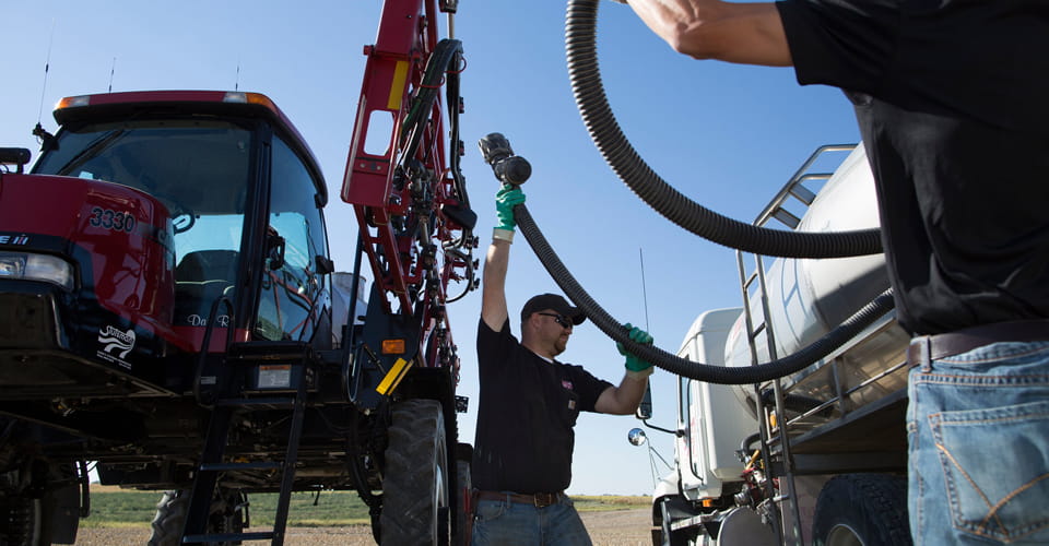 Pulling hoses out from the fuel truck