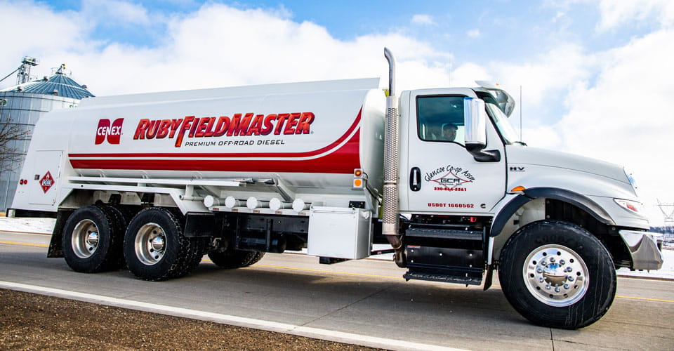 Cenex Ruby FieldMaster truck in front of a grain bin