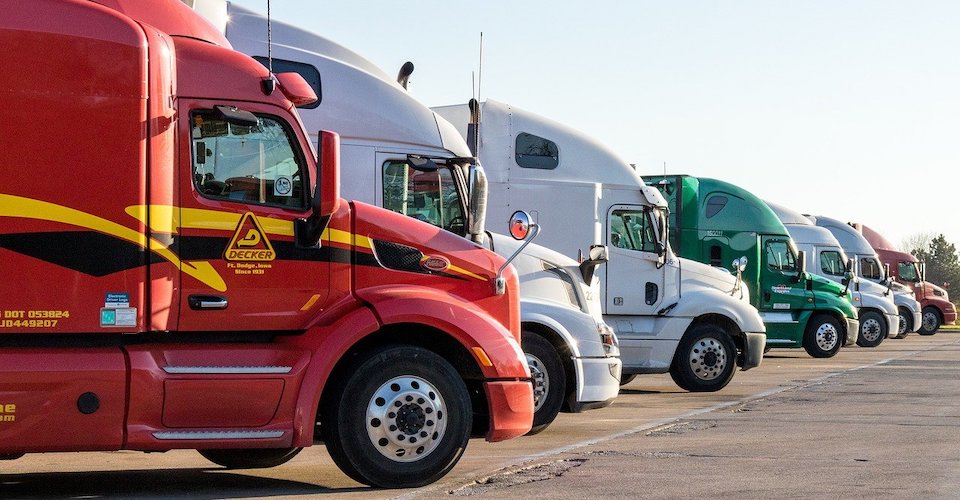 Semi cabs parked in a row