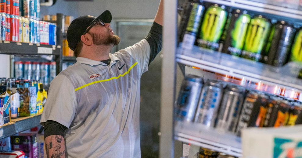 Man reaching into cooler