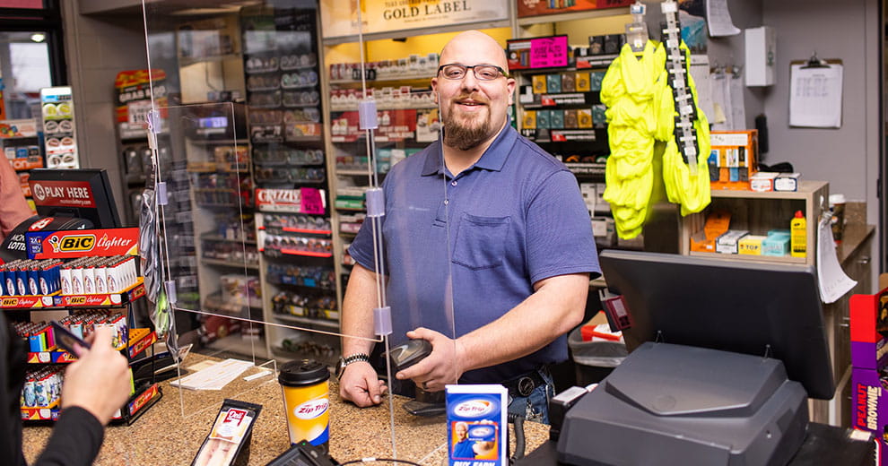 Cenex Zip Trip employee at the cash register