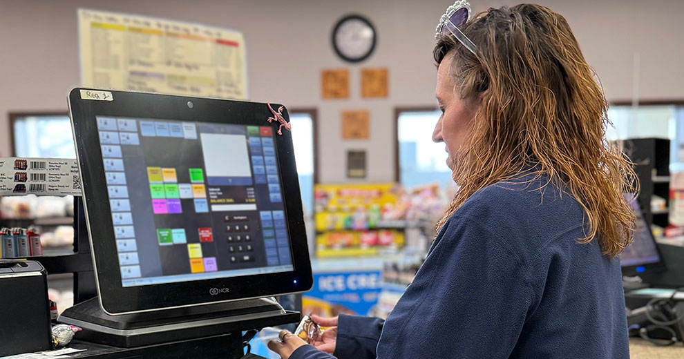 Cenex Zip Trip employee at the cash register