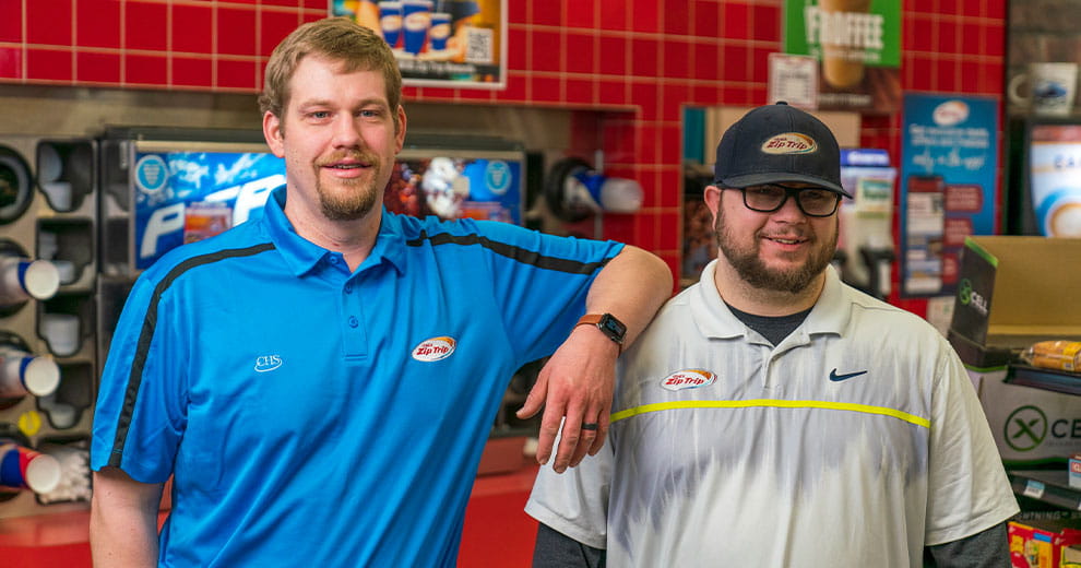 Two male Cenex Zip Trip employees smiling