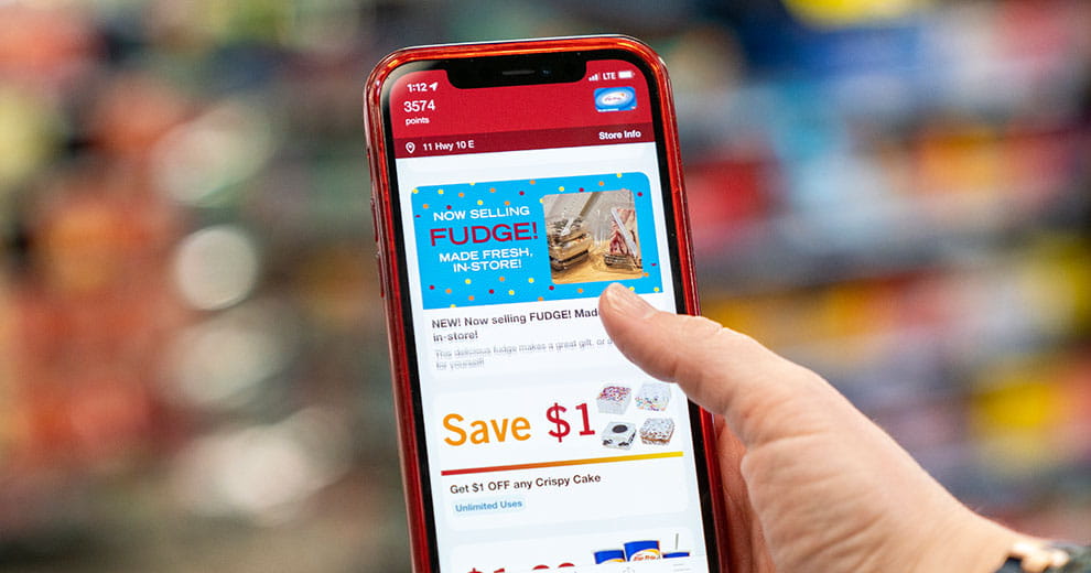 Cenex Zip Trip app in hand
