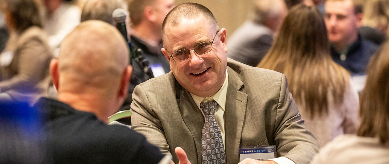 Cooperative owners talking around a table