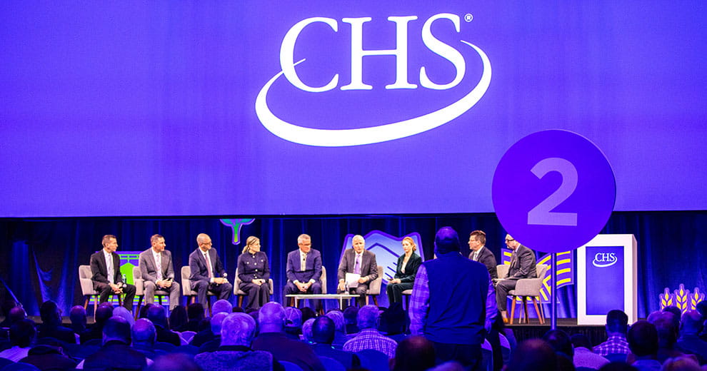 Rows of people facing a stage