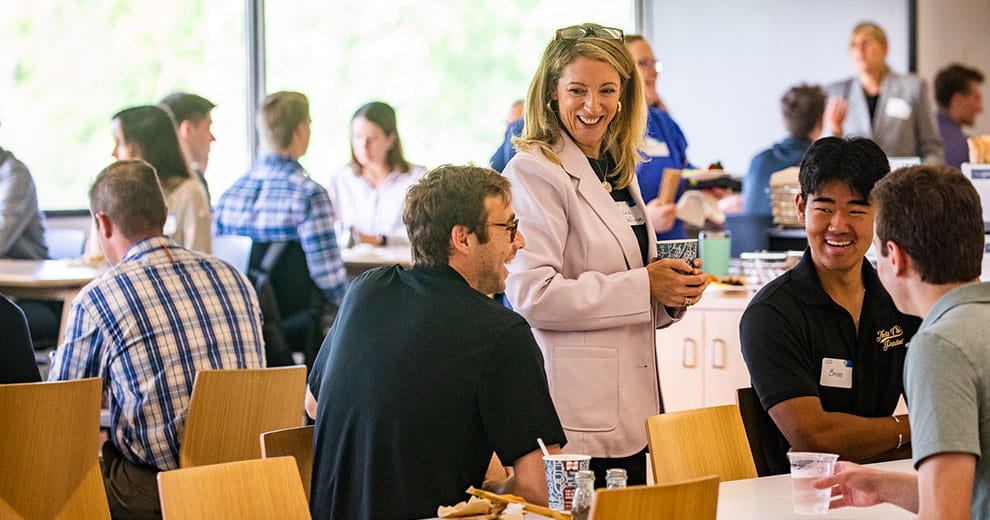 Olivia Nelligan with CHS employees and interns