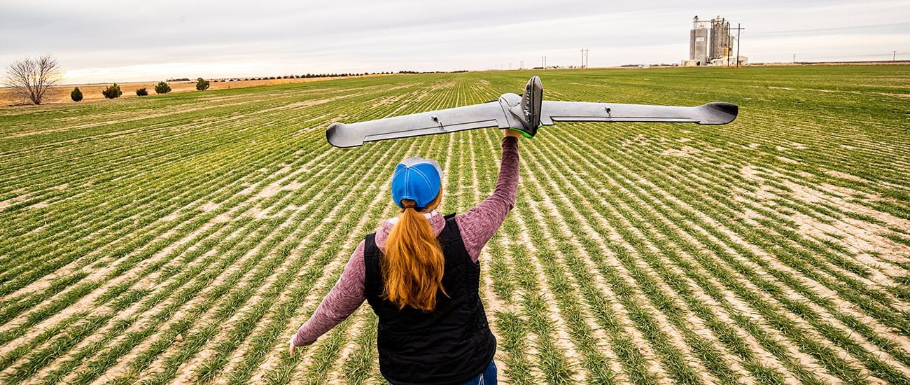 Woman holding a drone