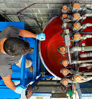 CHS blender and operator working on the seed treatment operation and delivery