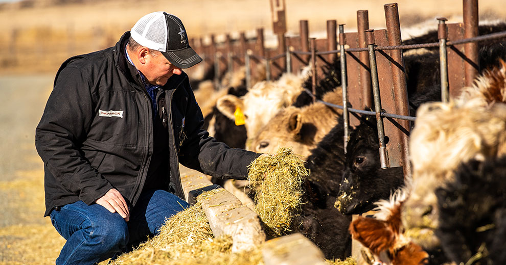 Man carrying bag of Payback Mineral product