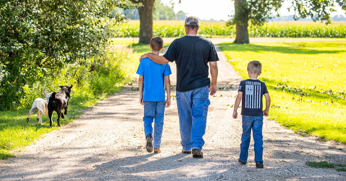 Blume family walking down the driveway