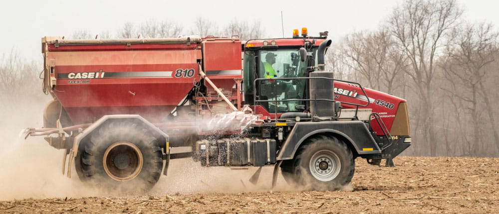 fertilizer spreader in field