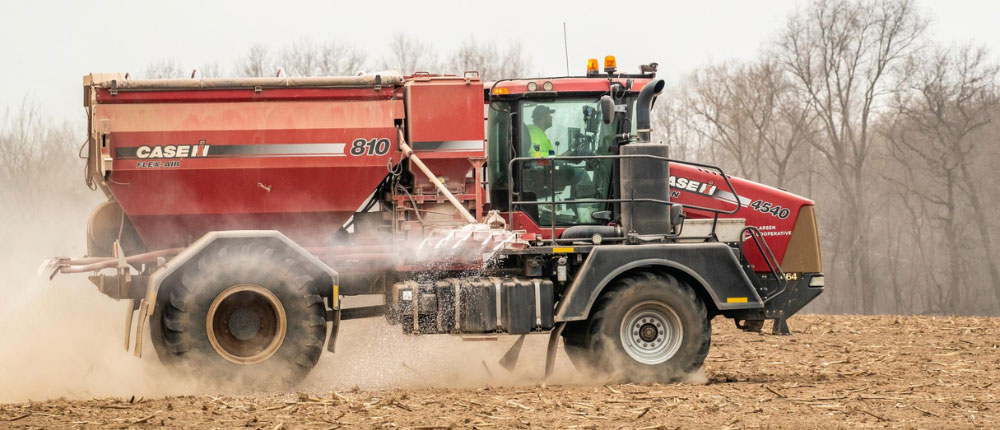 fertilizer spreader in field