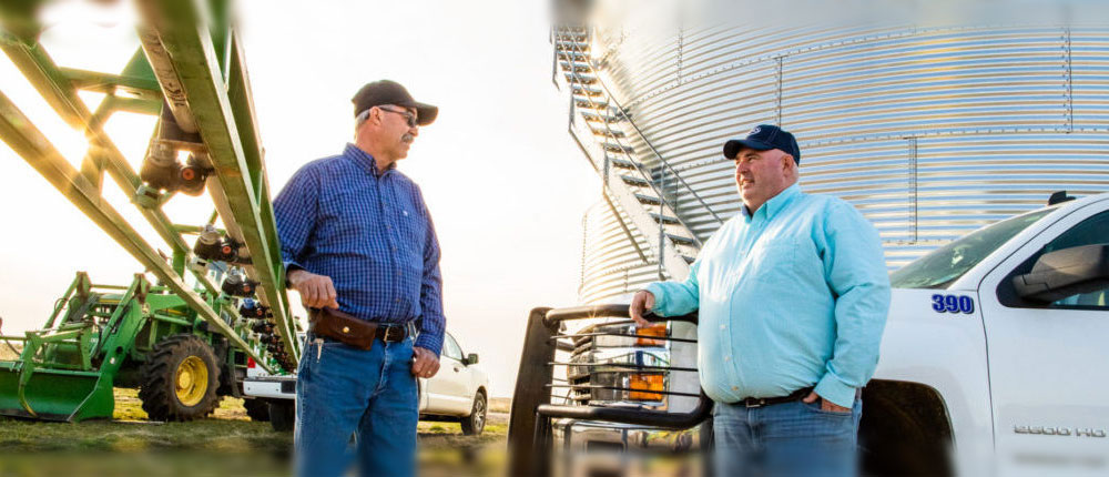 farmer and agronomist talking