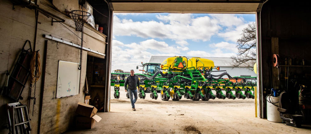 Grower walking into the barn