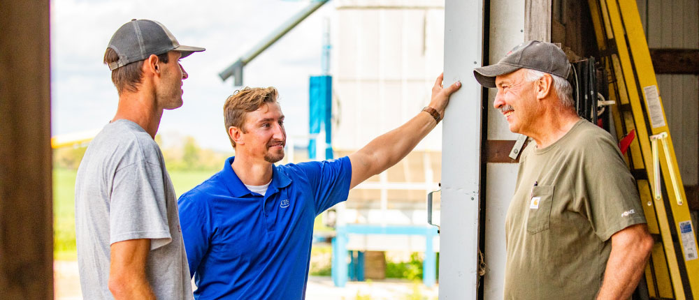 Agronomist and growers talking