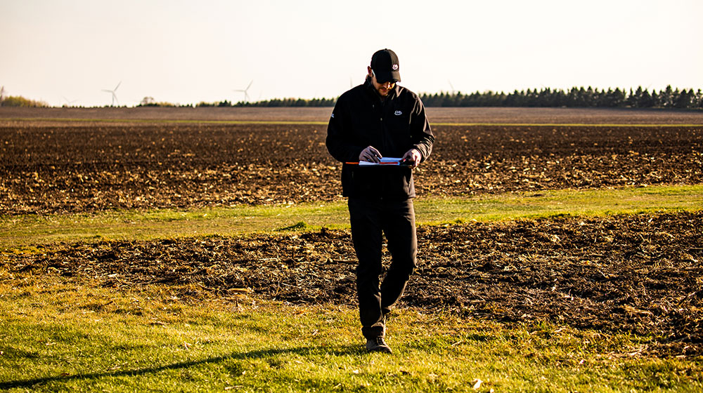 Agronomist in a field