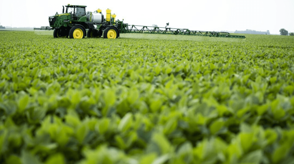 Sprayer in crop field