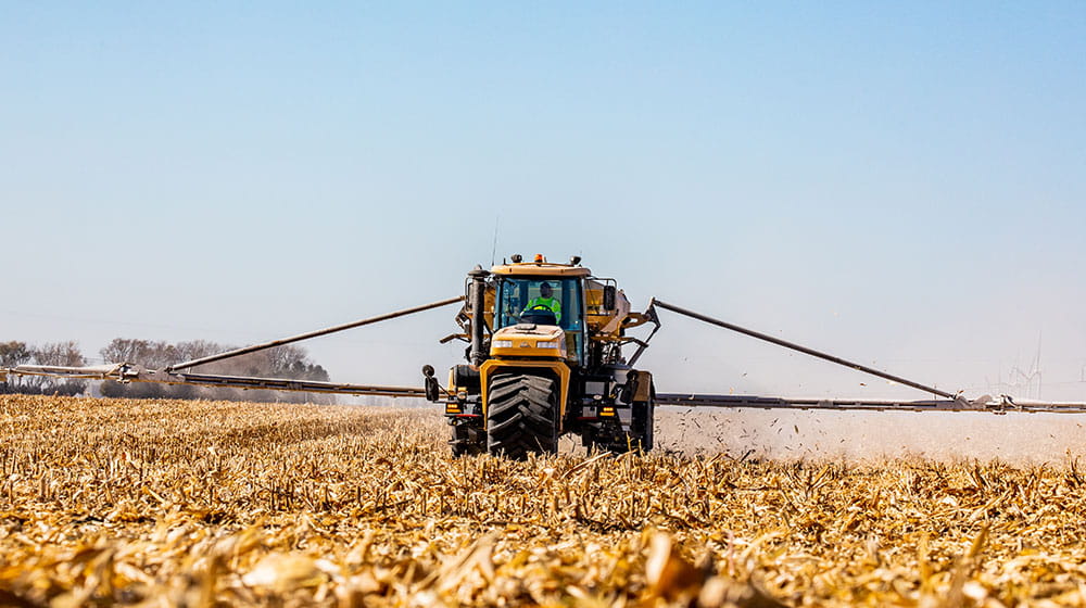 Tractor in a field after harvest