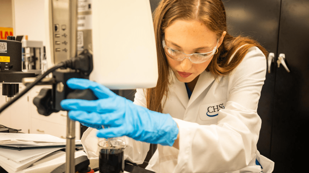 A woman working in a science lab
