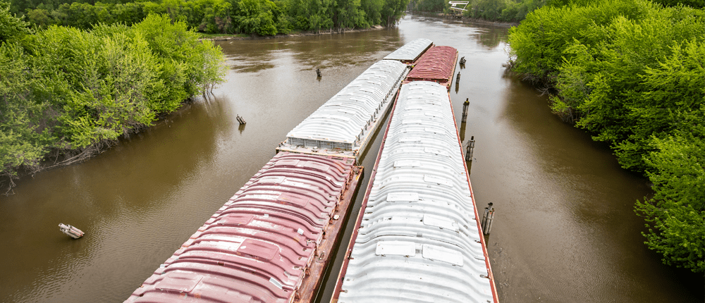 Barge floating down river