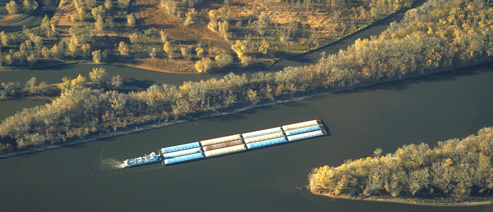 Barge floating down river