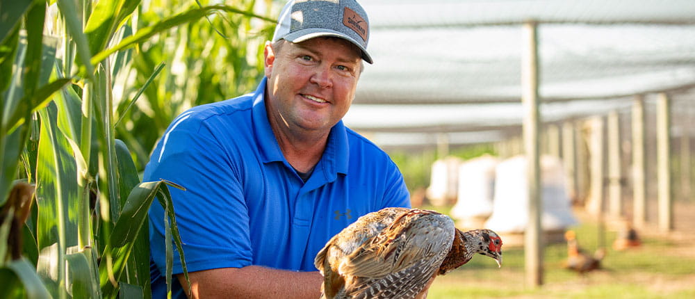 Man holding pheasant