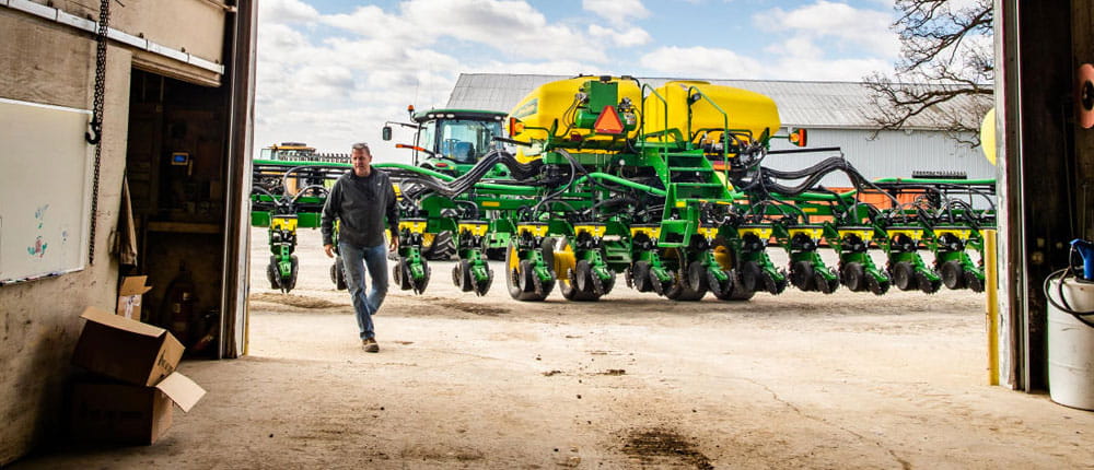 Farmer with planting equipment