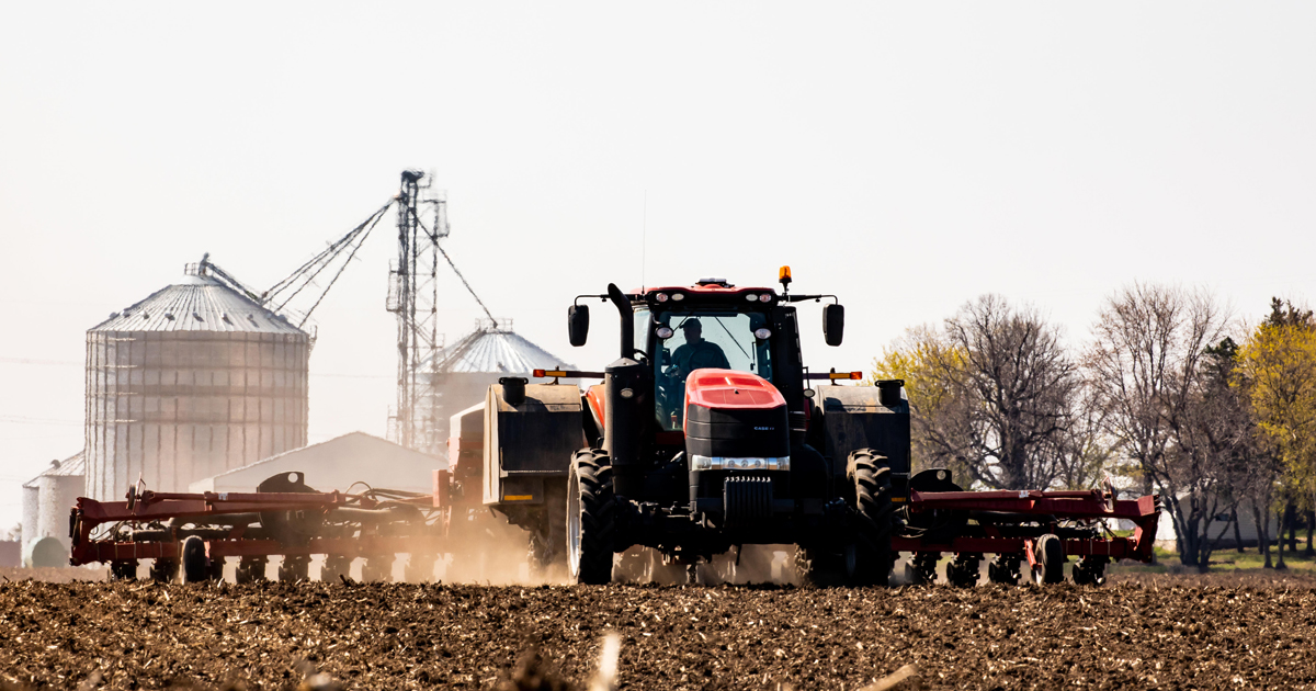 Tractor planting a field