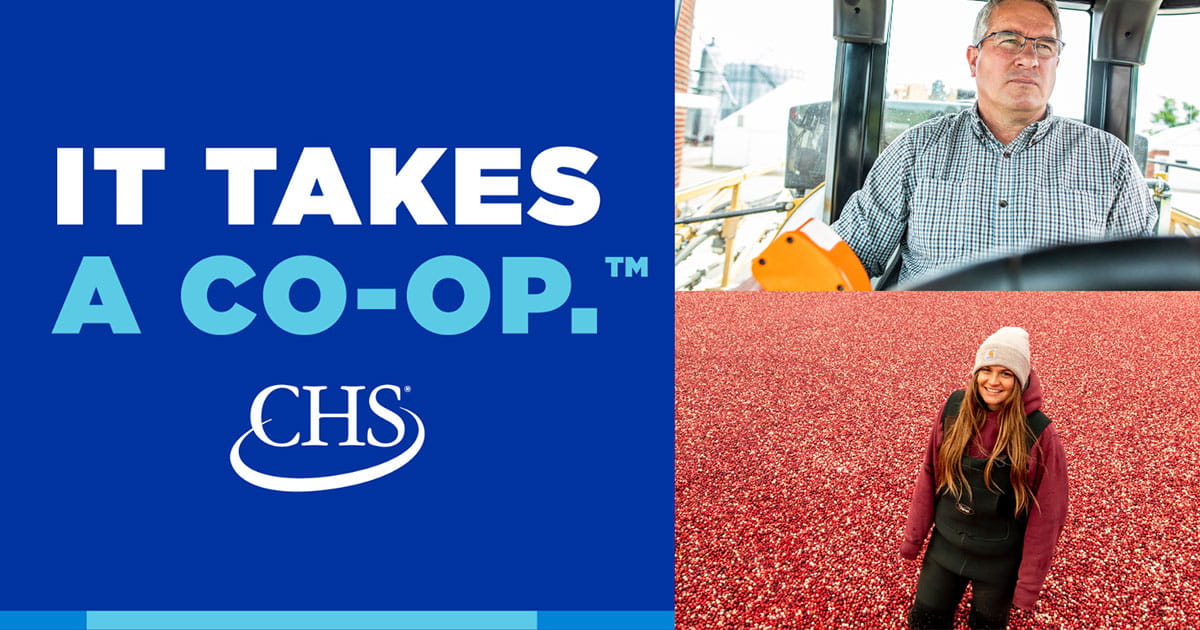 It takes a co-op logo with a man in a tractor and a woman in a cranberry field