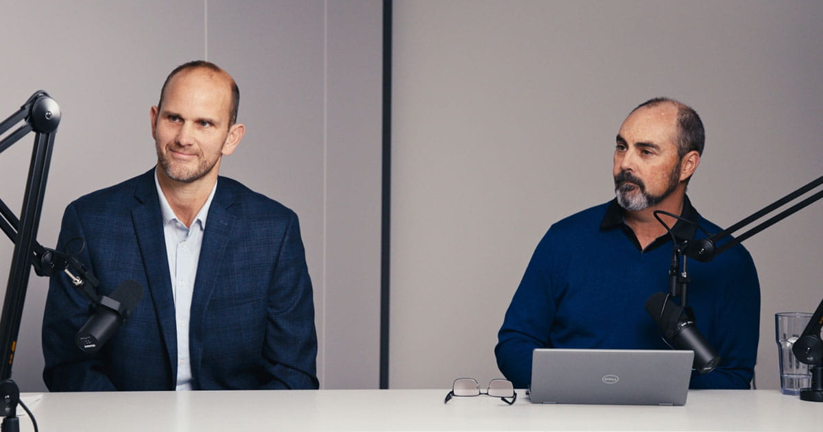 two men talking on a podcast