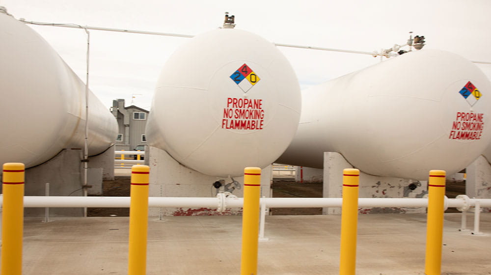 Three large propane tanks.