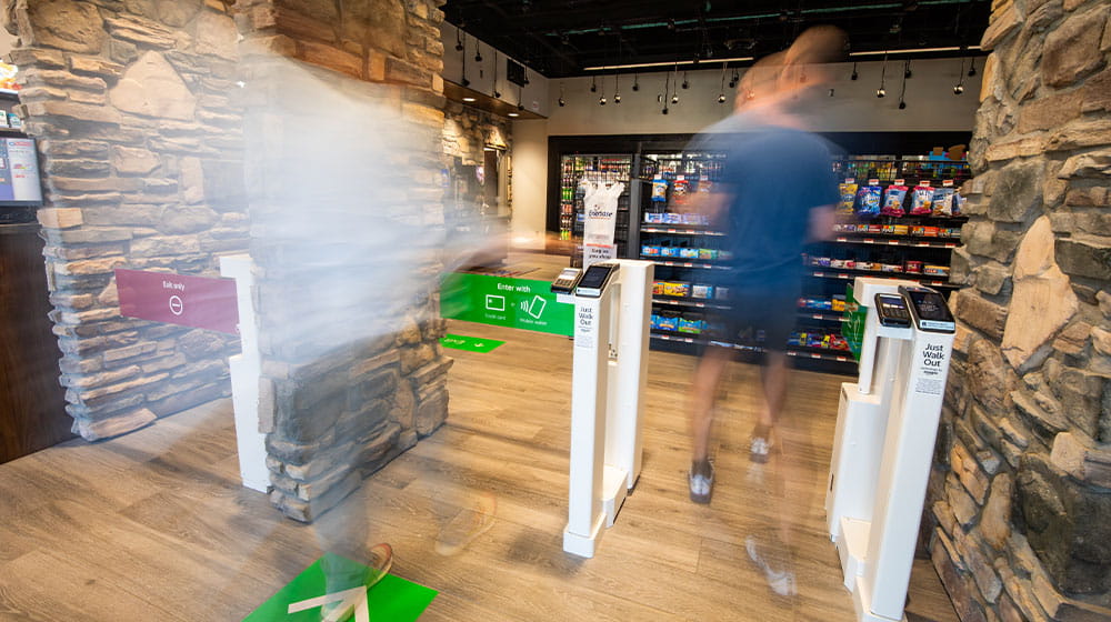 Man enters a contactless convenience store