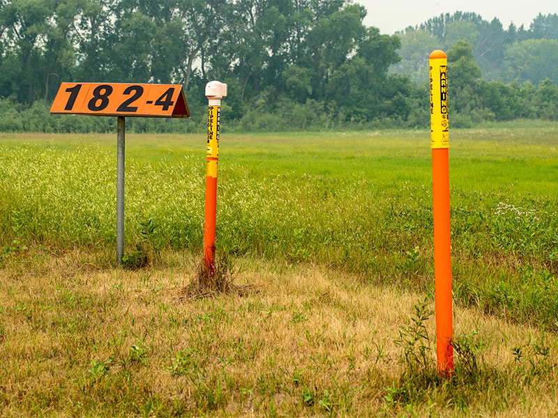 Once inside the line, members of the gang split into two groups and drive alongside the pipe’s route to track the PIG’s progress by following the tool’s electronic signal.