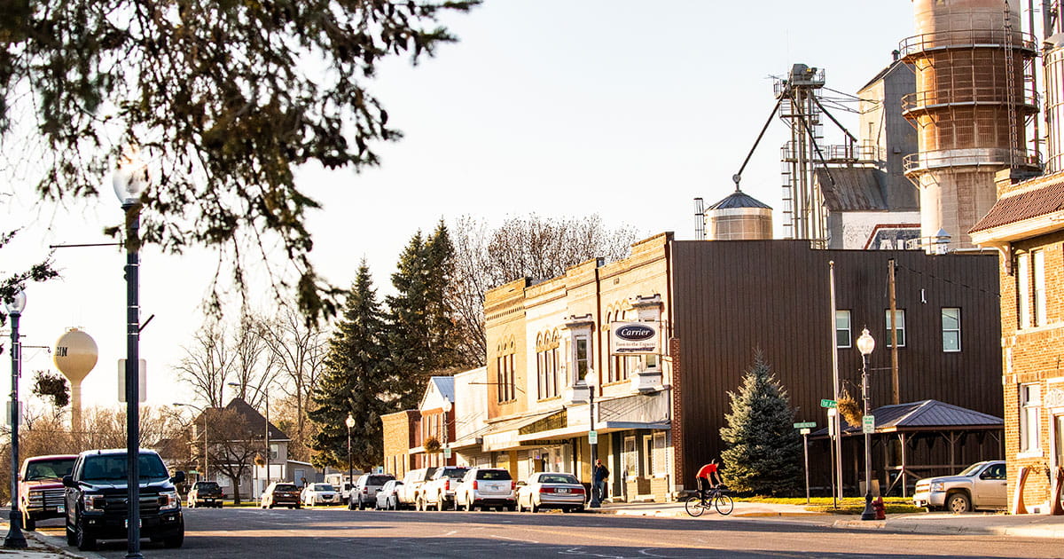 Rural downtown with cars.
