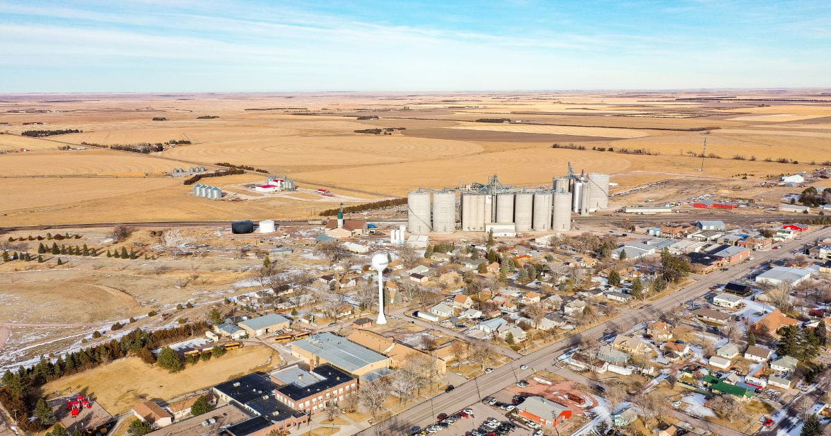 Rural town with a main street and surrounding farmland