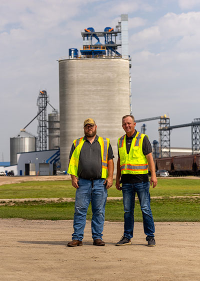 Two men in safety vests
